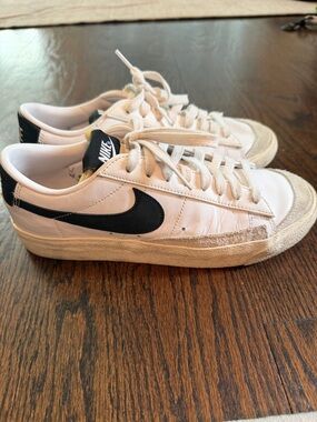 Nike White Leather Low-Top Sneakers with Black Swoosh